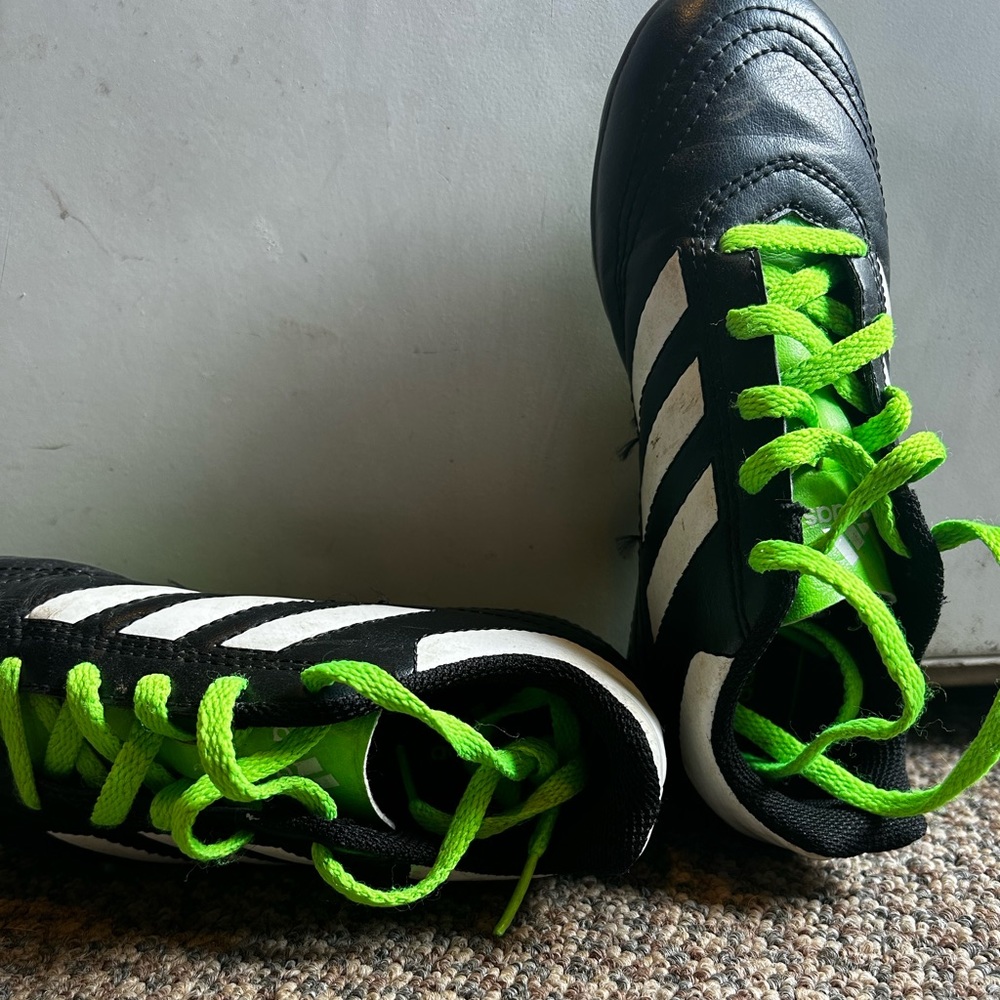 Adidas kids cleats w/green laces